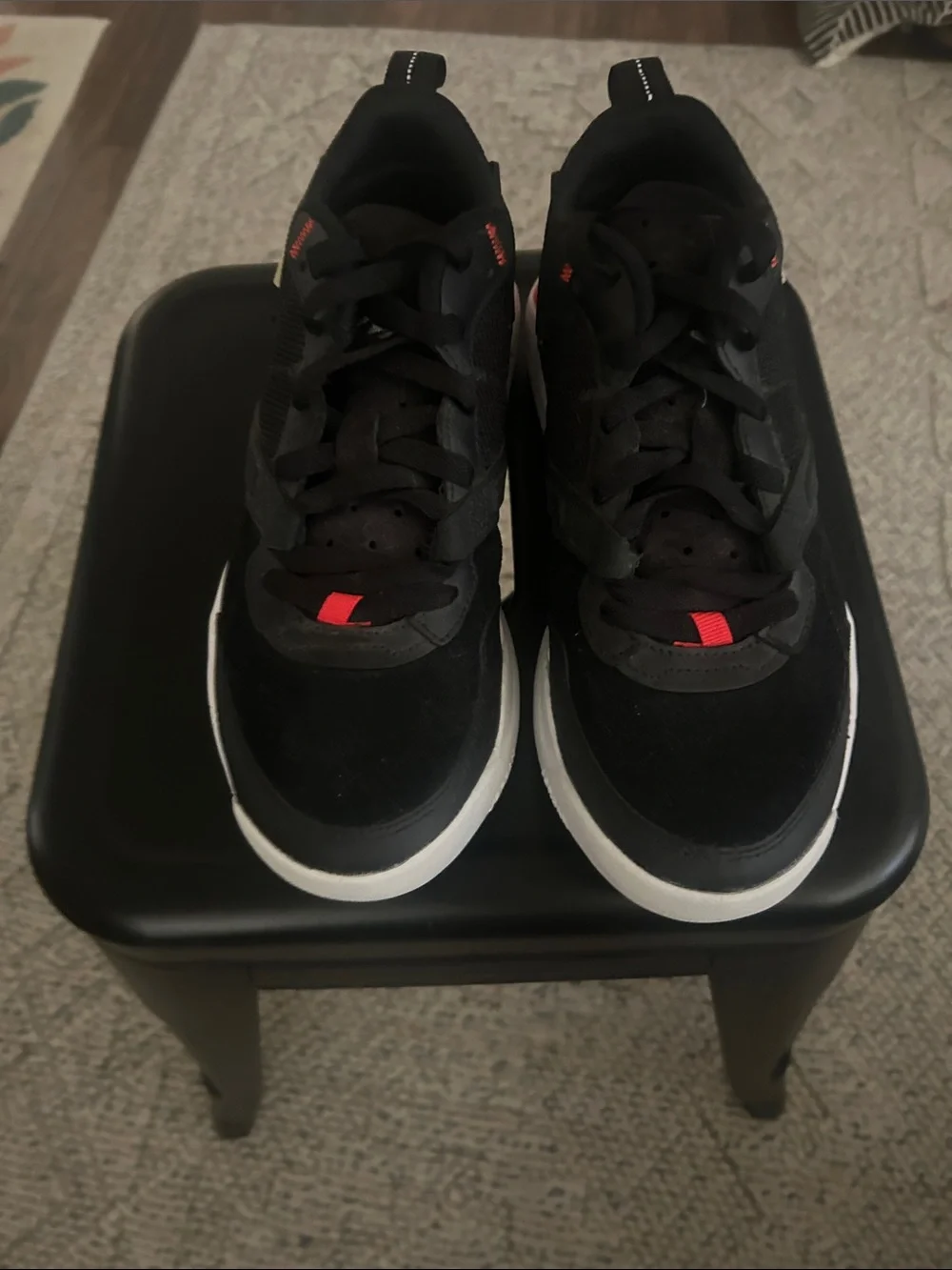 Women’s Jordans Black Athletic Sneakers with Red Accents